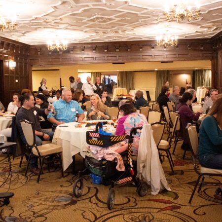 a group of people sitting in a room