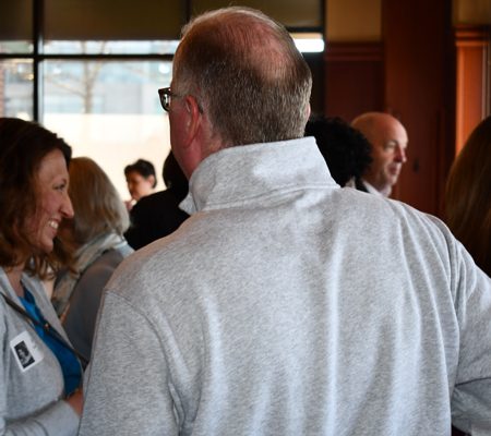 a person in a grey shirt