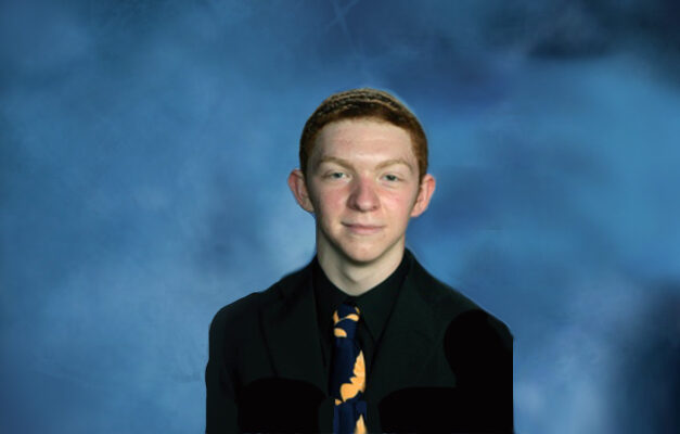 a young person in a black shirt and tie