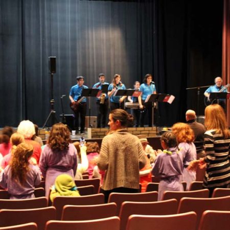 a group of people in a theater
