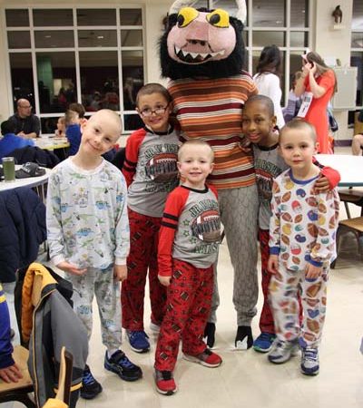 a group of children posing for a photo