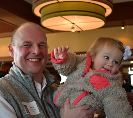 a person holding a baby