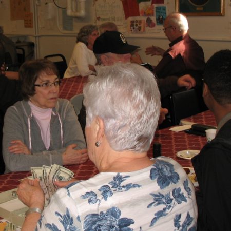 a group of people sitting at a table