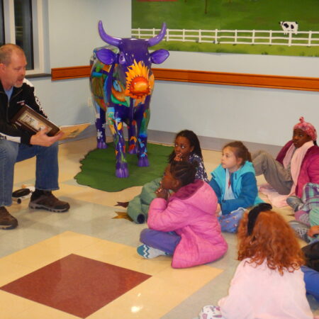 a group of children sitting on the floor