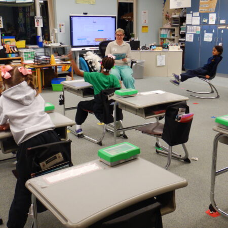 a group of children in a classroom
