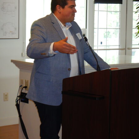 a person standing at a podium