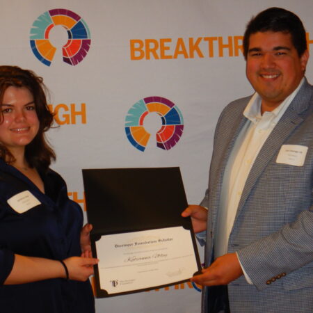 people holding a certificate