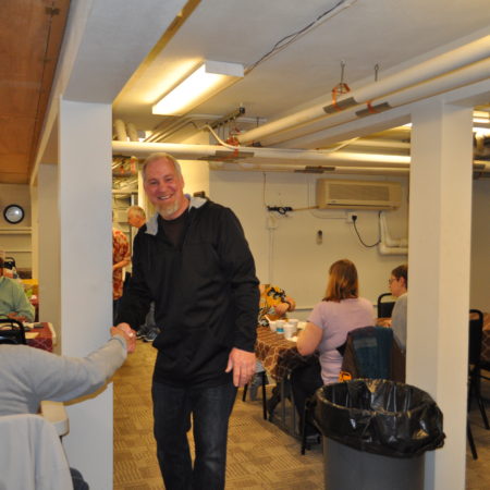a person shaking hands with another person