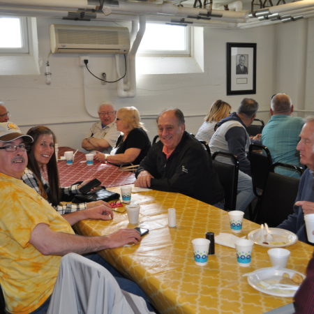 a group of people sitting at a table