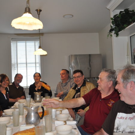 a group of people sitting at a table