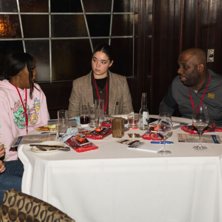 a group of people sitting at a table