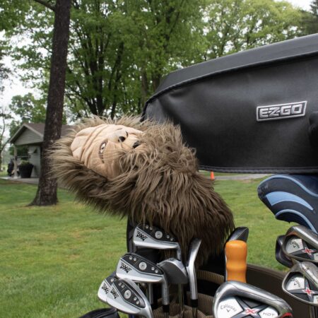 a golf club with a stuffed animal