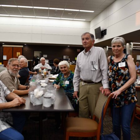 a group of people around a table