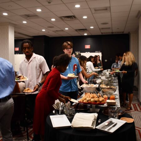 a group of people at a buffet
