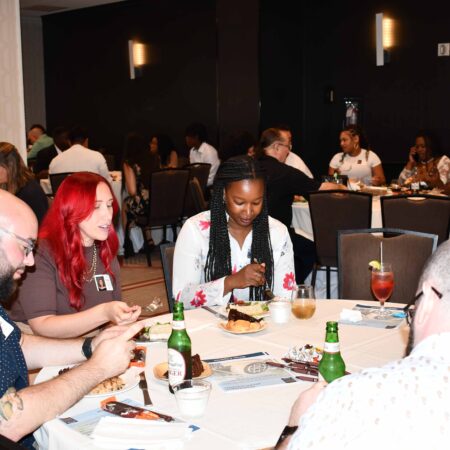 a group of people sitting at a table