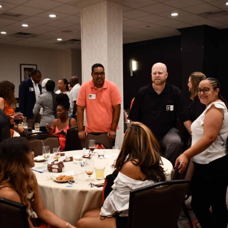 a group of people around a table