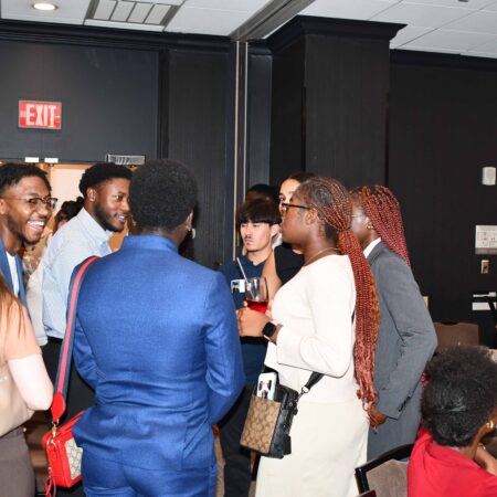 a group of people standing in a room