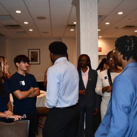 a group of people standing in a room