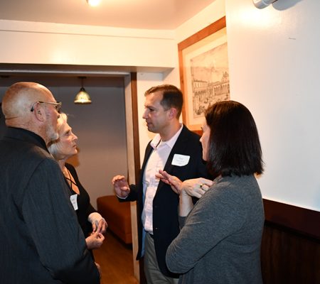 a group of people standing in a room