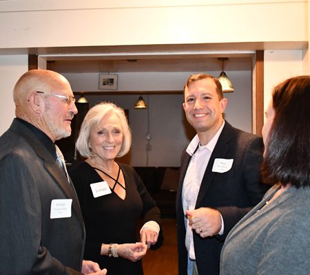 a group of people standing in a room