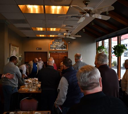 a group of people standing in a room