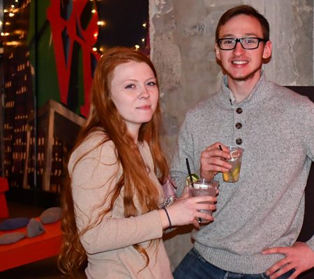 people holding drinks