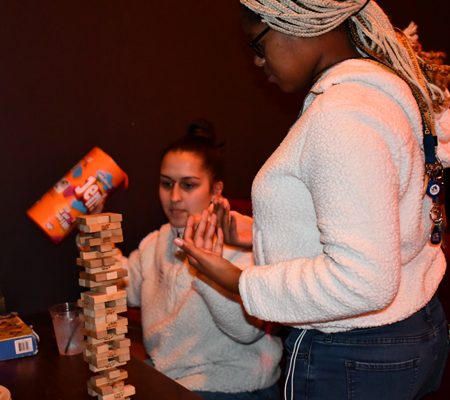 a person playing a game with a person
