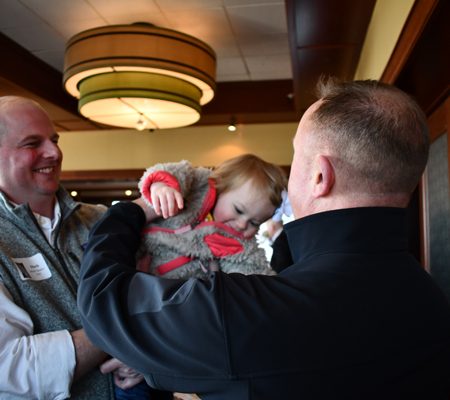 a person holding a baby