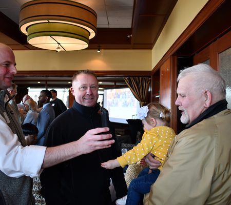 a group of men and a baby