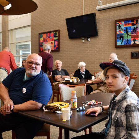 a group of people sitting at a table