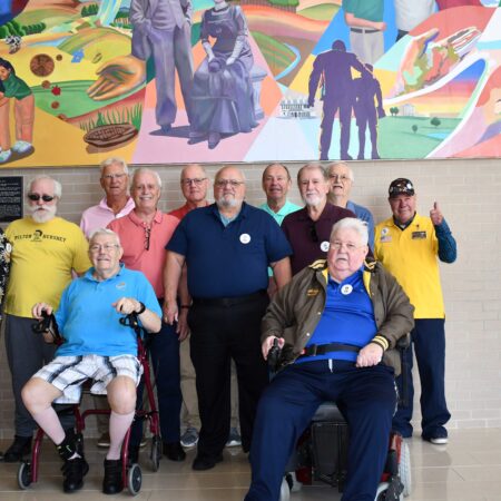 a group of people posing for a photo