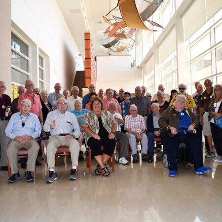a group of people sitting in chairs