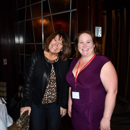 a couple of women smiling