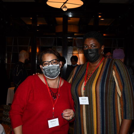 a group of women wearing face masks