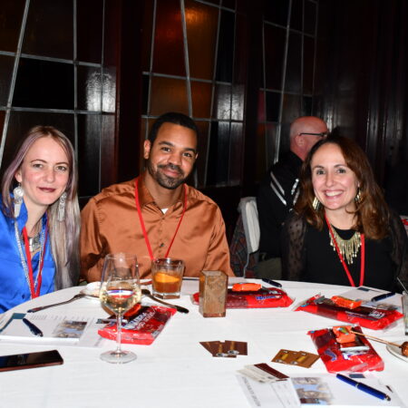 a group of people sitting at a table