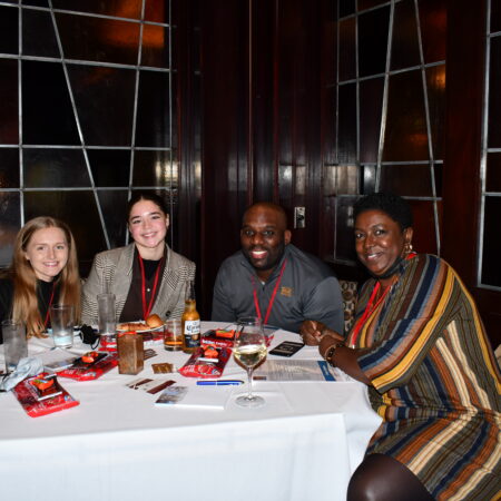 a group of people sitting at a table