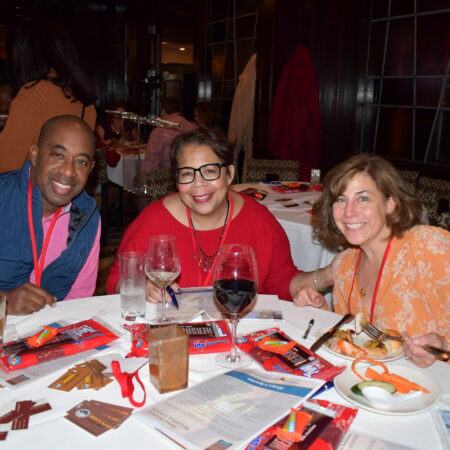 a group of people sitting at a table