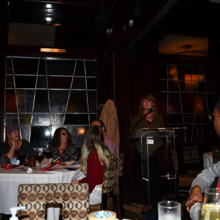 a group of people sitting at a table