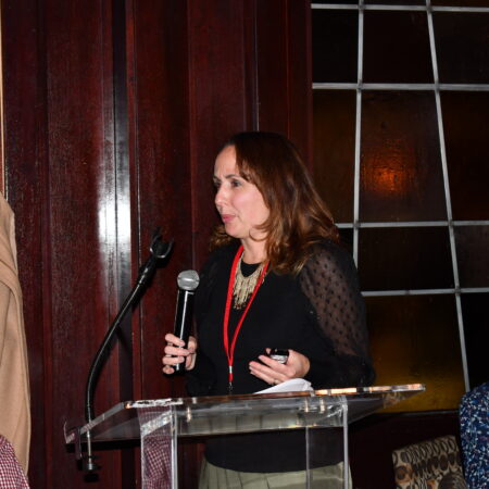 a person standing at a podium