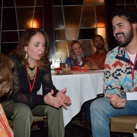 a group of people sitting at a table