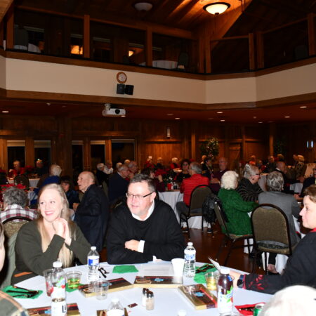 a group of people sitting at a table