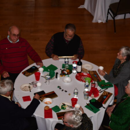 a group of people sitting around a table