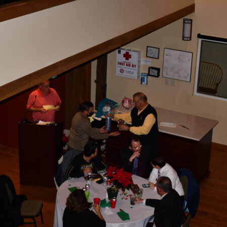 a group of people around a table
