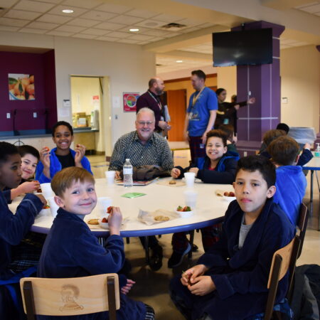 a group of people sitting at a table