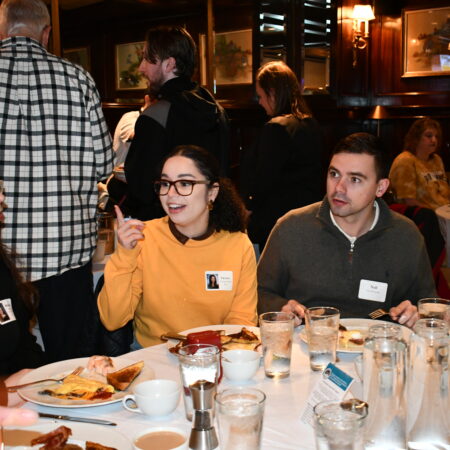a group of people sitting at a table