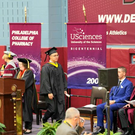 a group of people in graduation gowns