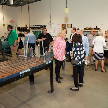 a group of people in a factory