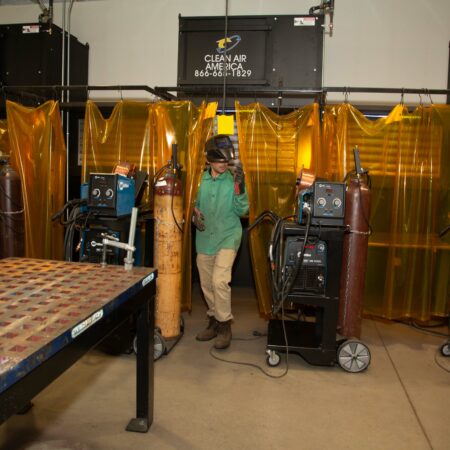 a person standing in a factory