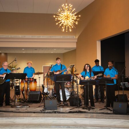 a group of people playing instruments