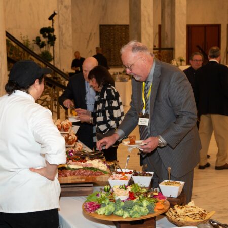 a group of people at a buffet